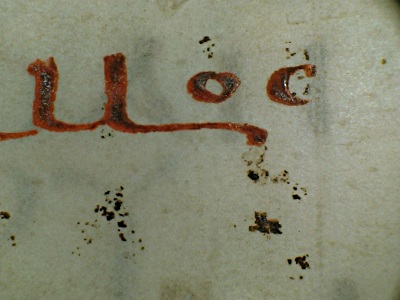 Detail of a dense red ink used for the text